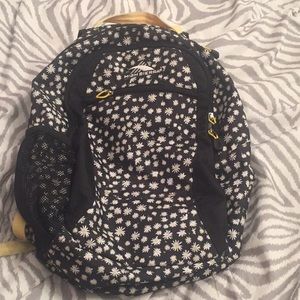 A daisy patterned backpack